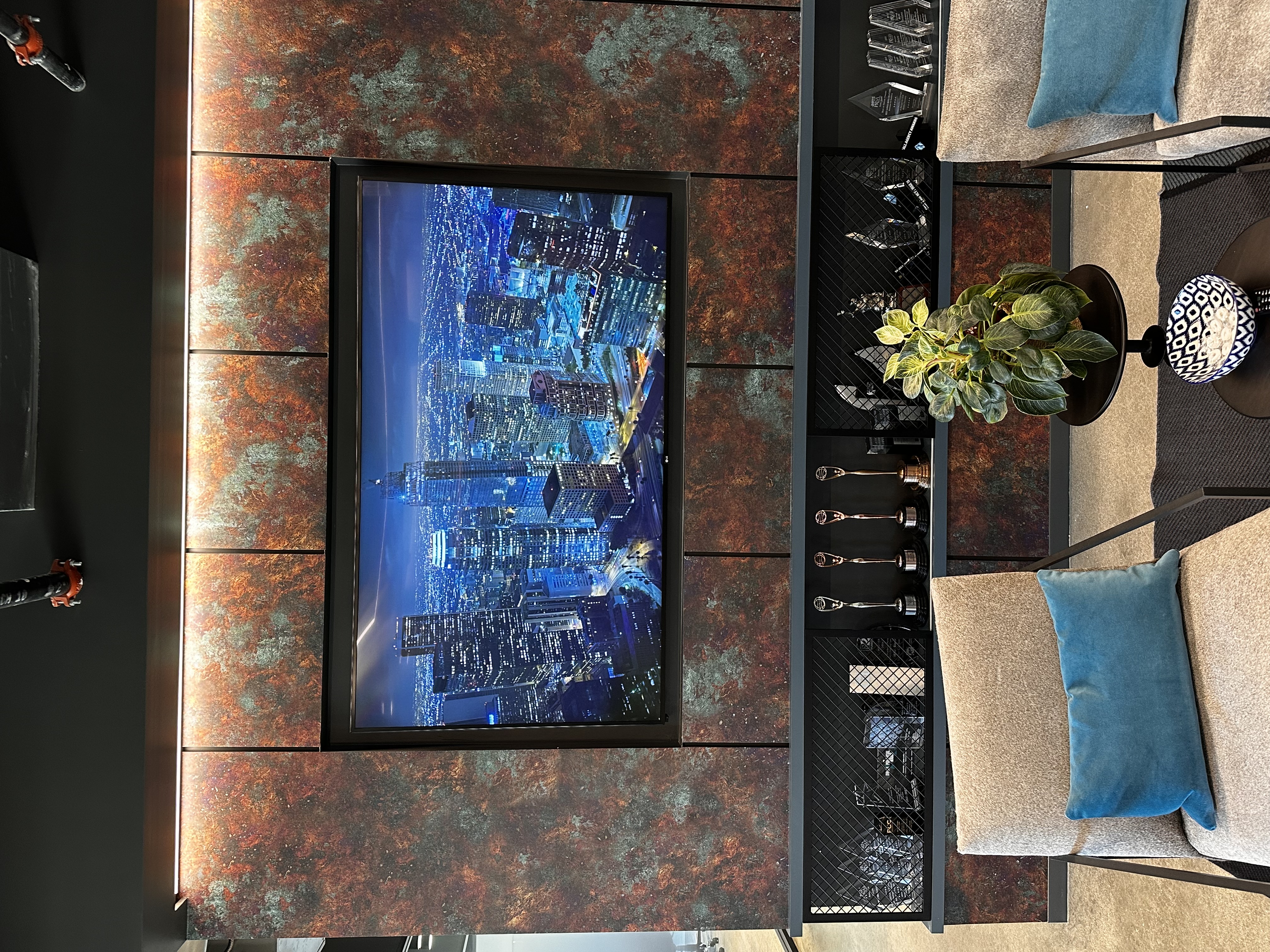 Wall-mounted TV with soundbar setup